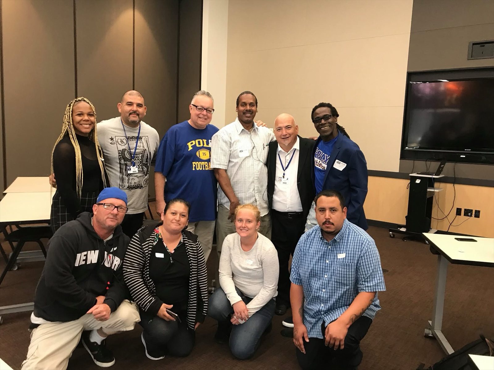 Craig Ellis with a group after a re-entry program session