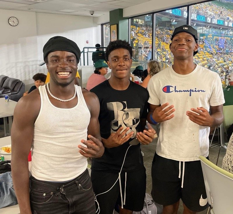 Three of the young men Craig has mentored since they were thirteen